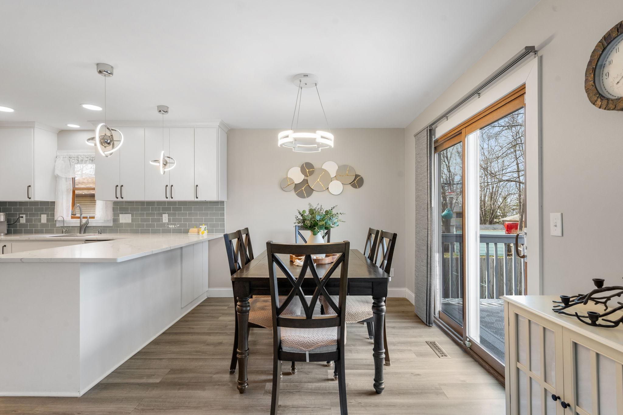 Updated lighting in the dining room and kitchen.