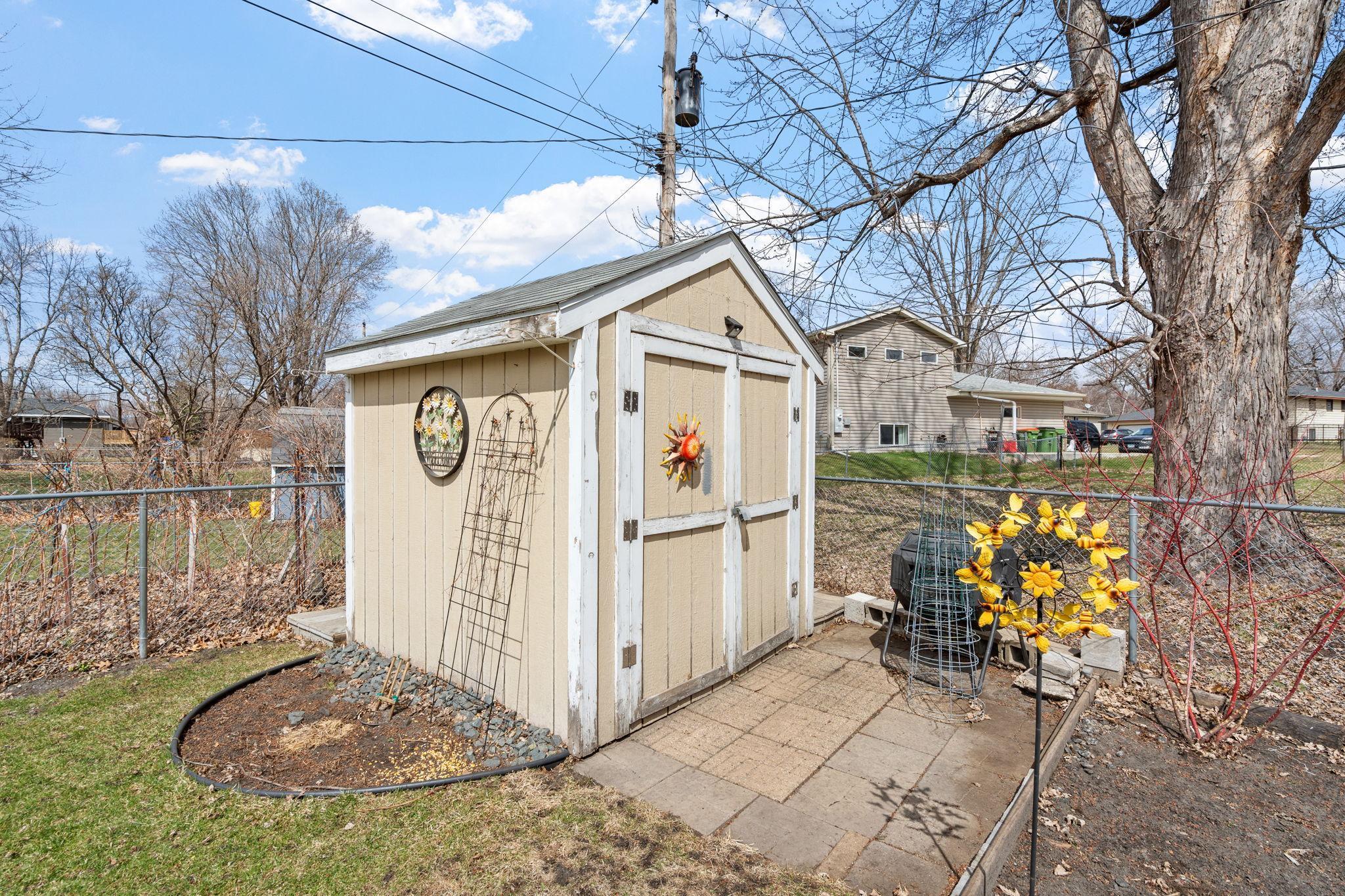Rustic garden shed for all of your tools.