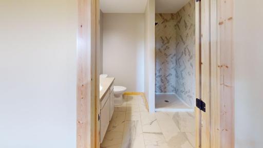 Unit 1 --3/4 bathroom --tiled floors/shower