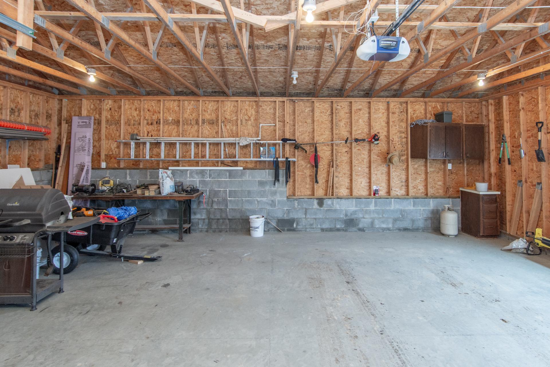 Spacious, powered garage—ideal for a workshop, recreational gear, or extra storage.