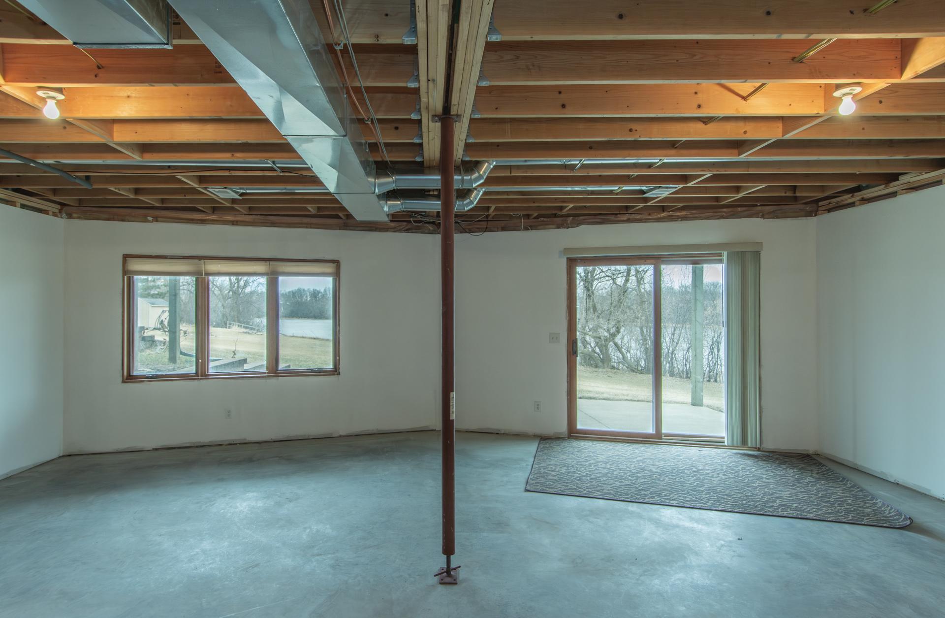 Unfinished walk-out lower level ready for your ideas and future expansion.