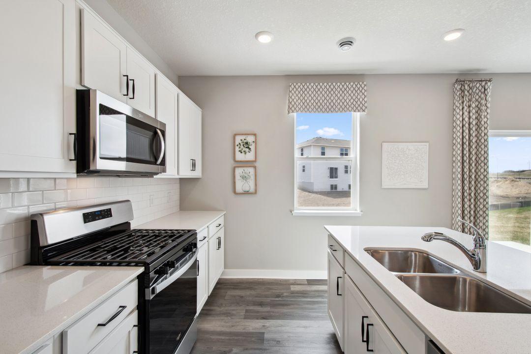 Another view of the kitchen. Note the window that allows you to see the side yard while you are preparing food.