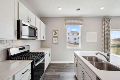 Another view of the kitchen. Note the window that allows you to see the side yard while you are preparing food.