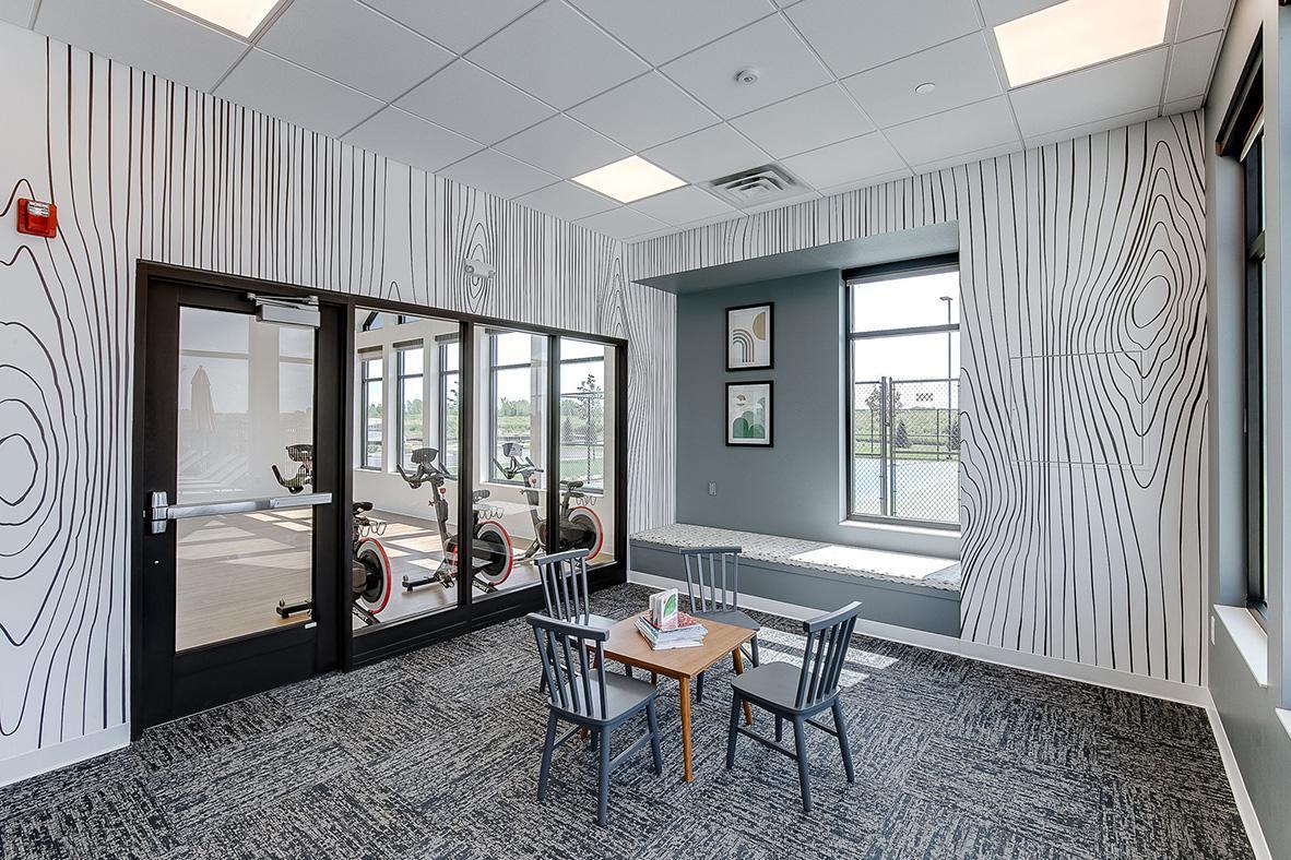 There is even an enclosed space for kids to play while parents work out!.jpg