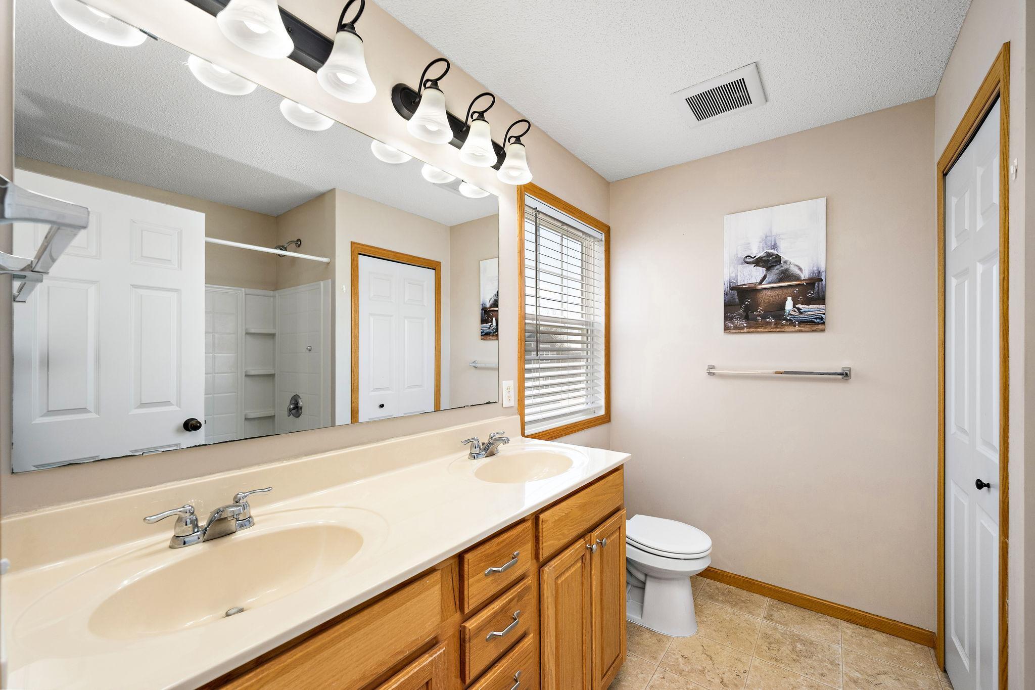 Private owners bathroom with dual sinks!