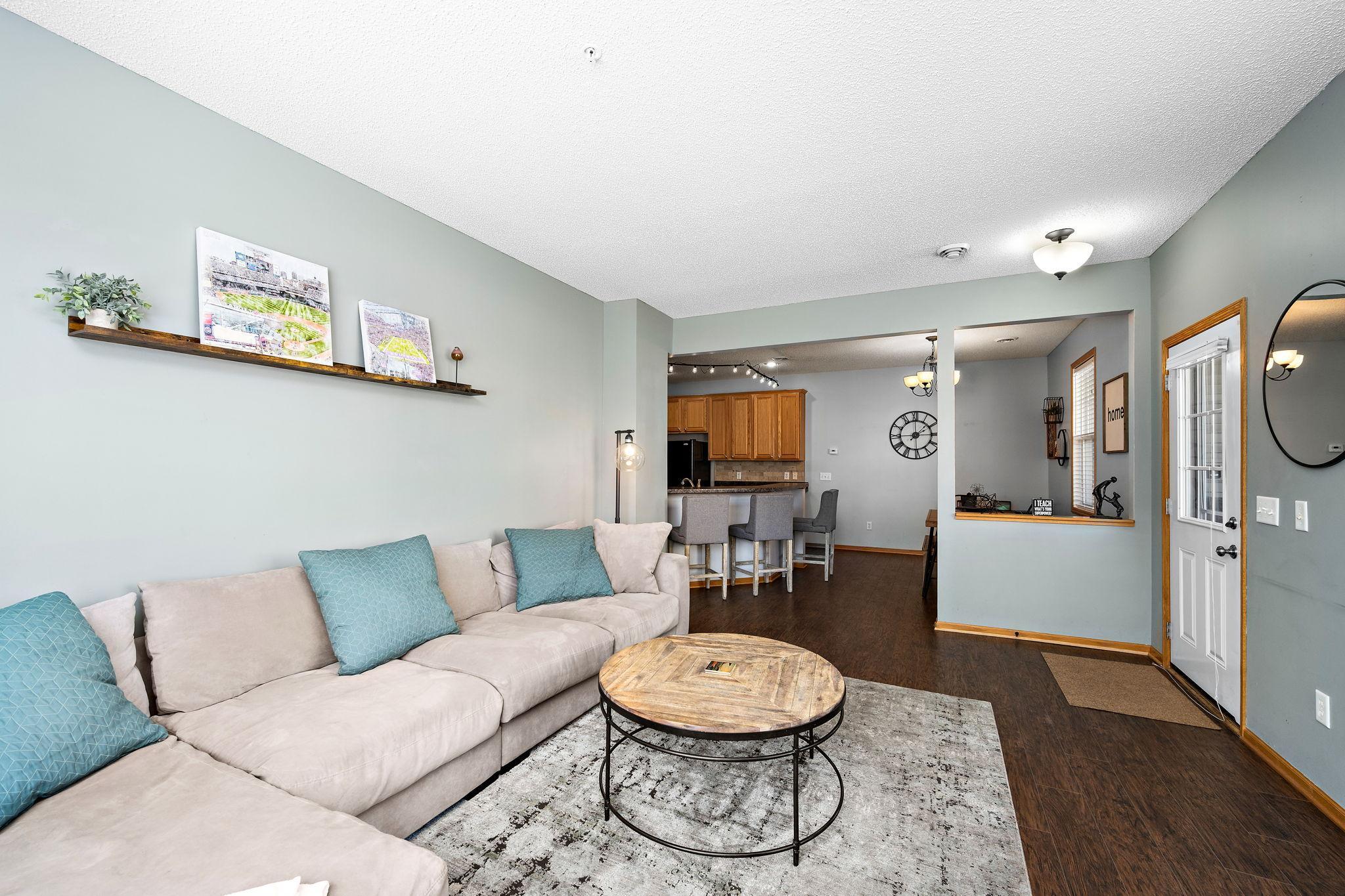 Open to the dining area and kitchen