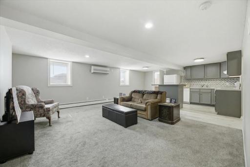 Egress windows throughout three bedroom apartment unit. Southern exposure in Living Room. Ductless mini split in this unit.