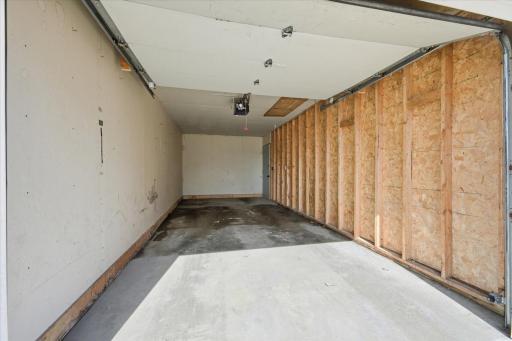 Garage Stall Interior. Fold down ladder leads to attic storage.