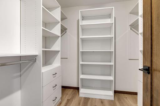 Closet organizers in the primary bedroom closet