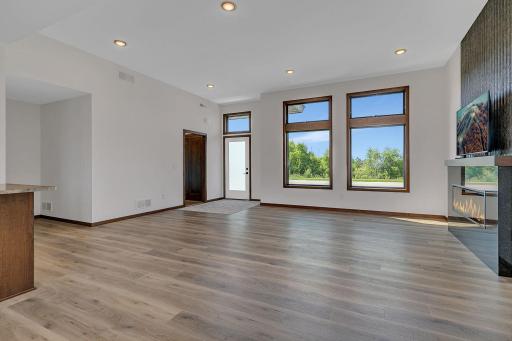 Large windows with transoms provide plenty of southern exposure light