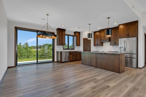 Open great room with spacious kitchen, dining and living room