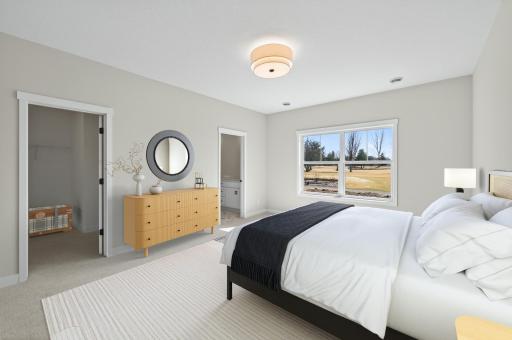 Primary bedroom with private ensuite and walk-in closet. *Virtually staged