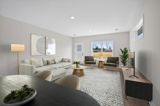 Living room with tons of natural sunlight flowing through! *Virtually staged