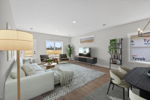 Living room with tons of natural sunlight flowing through! *Virtually staged