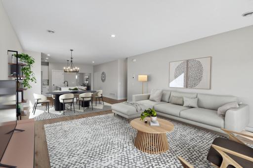 Living room with tons of natural sunlight flowing through! *Virtually staged
