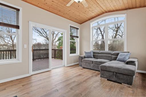 Sun room leading to an entertaining deck!