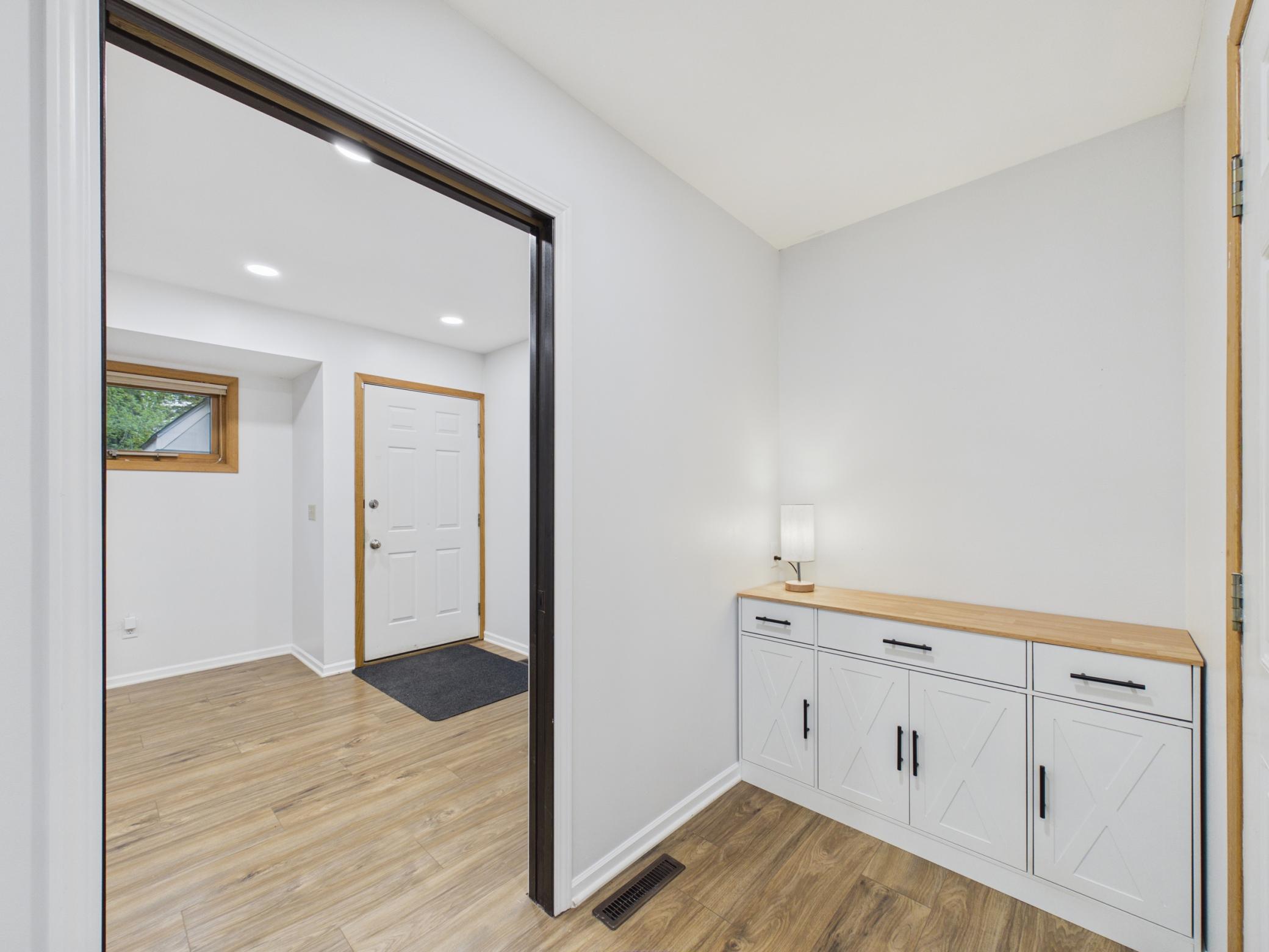 Entry area from the front door goes to the living room or nice office/den/laundry room.