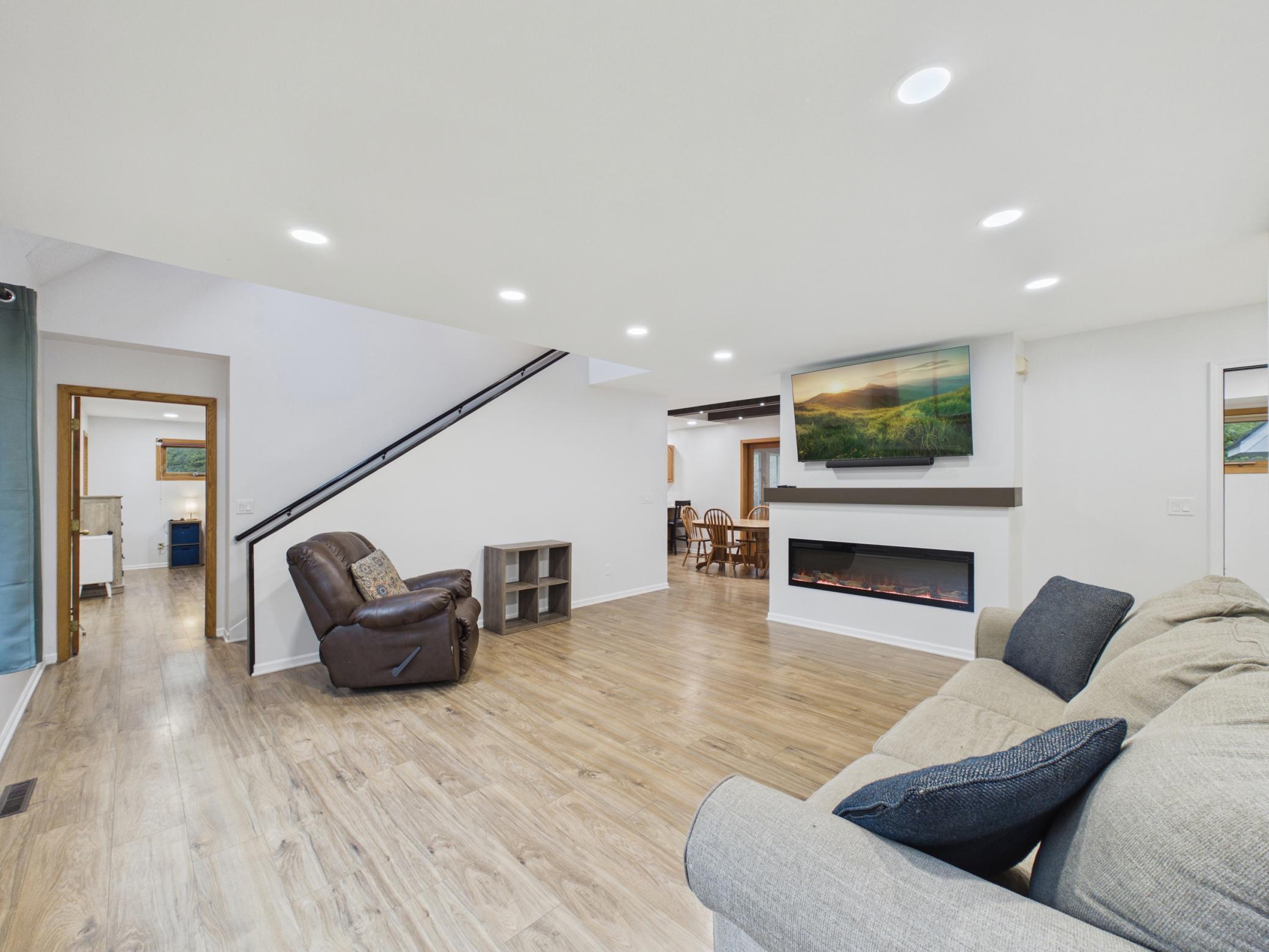 Easy access to the rest of the home, and check out the electric fireplace!