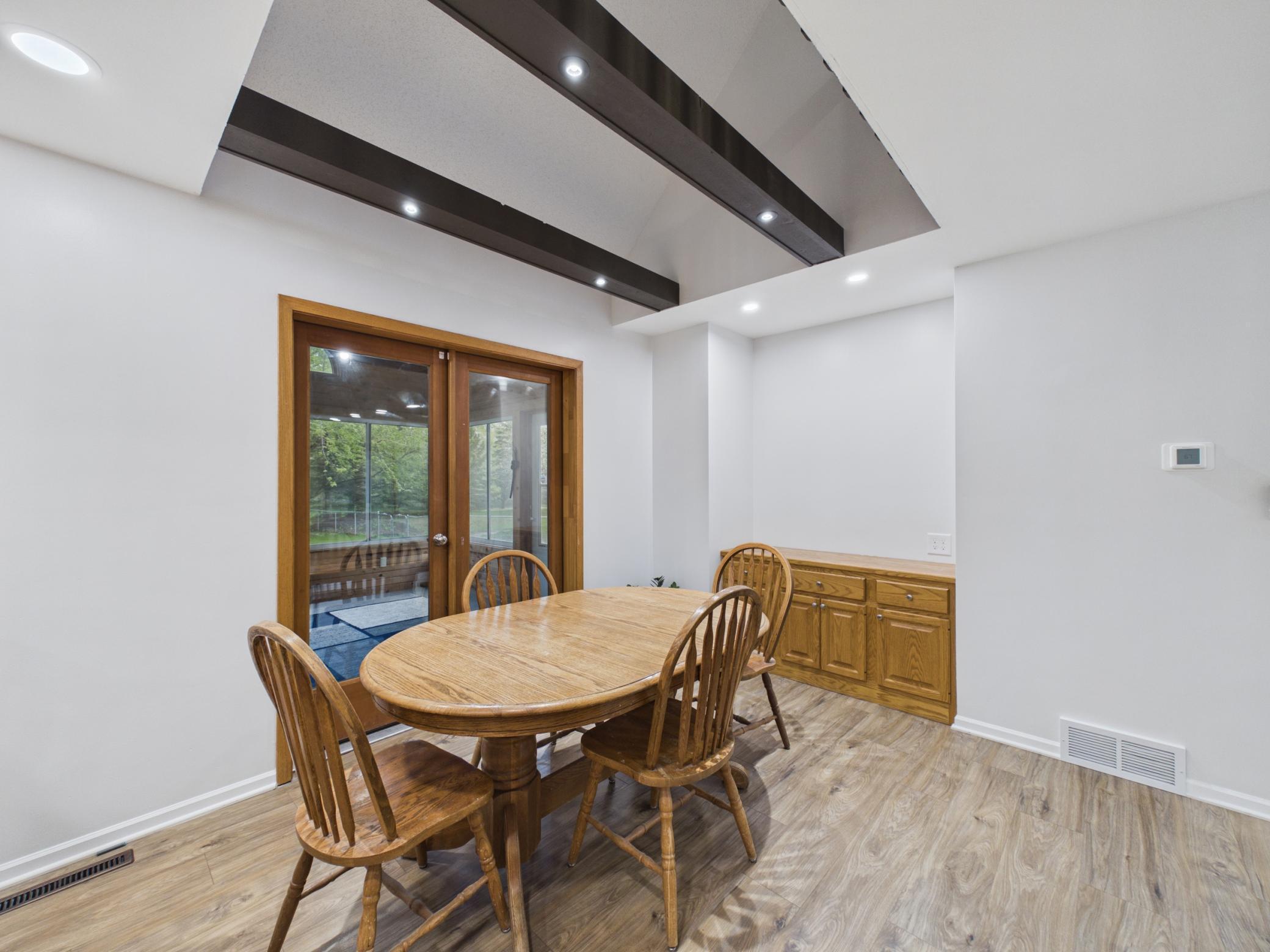 Access to the three seasons porch and access to the spacious backyard.