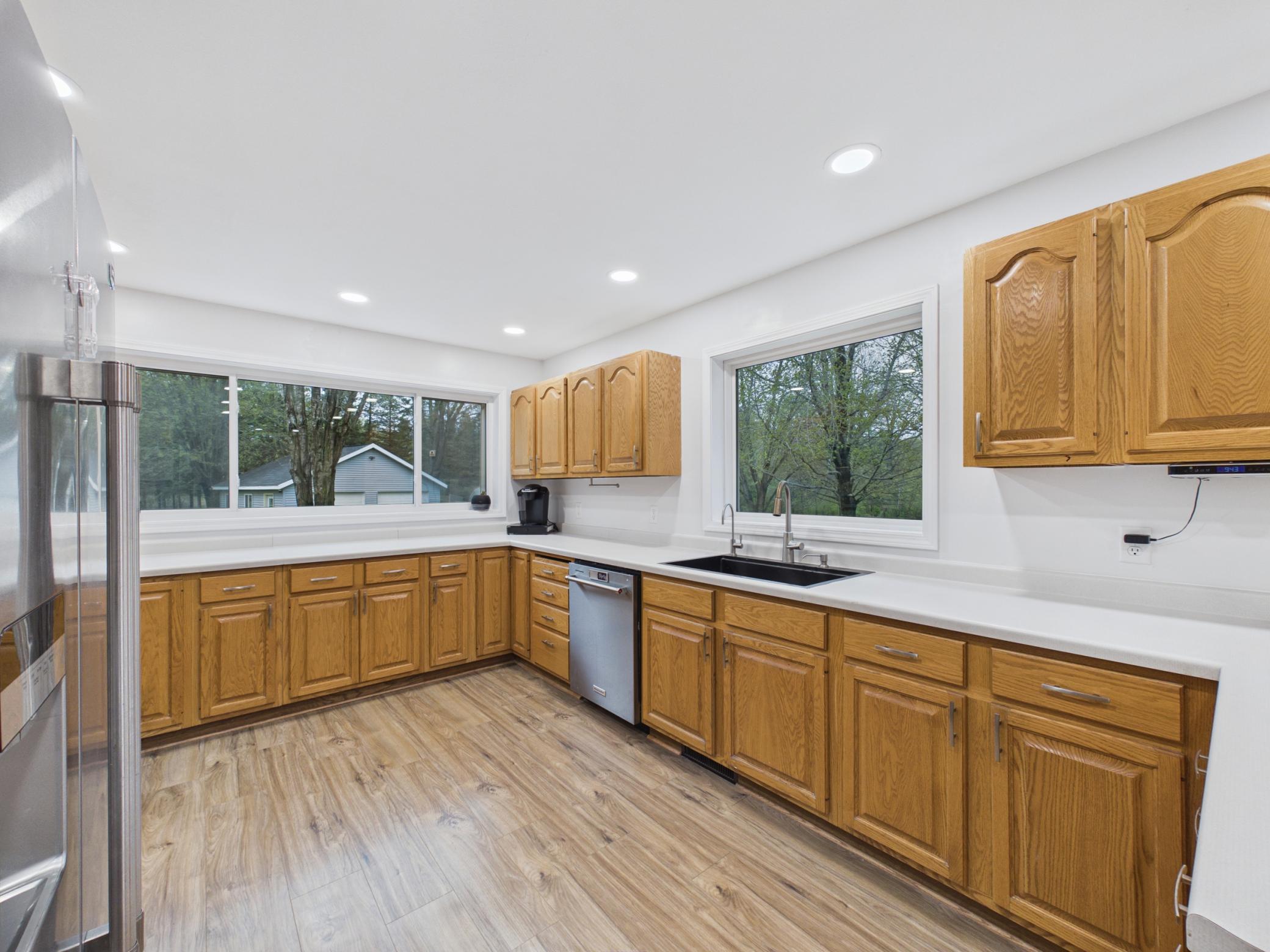 So much counter-space and cabinets. Large window was installed recently as well for great views.
