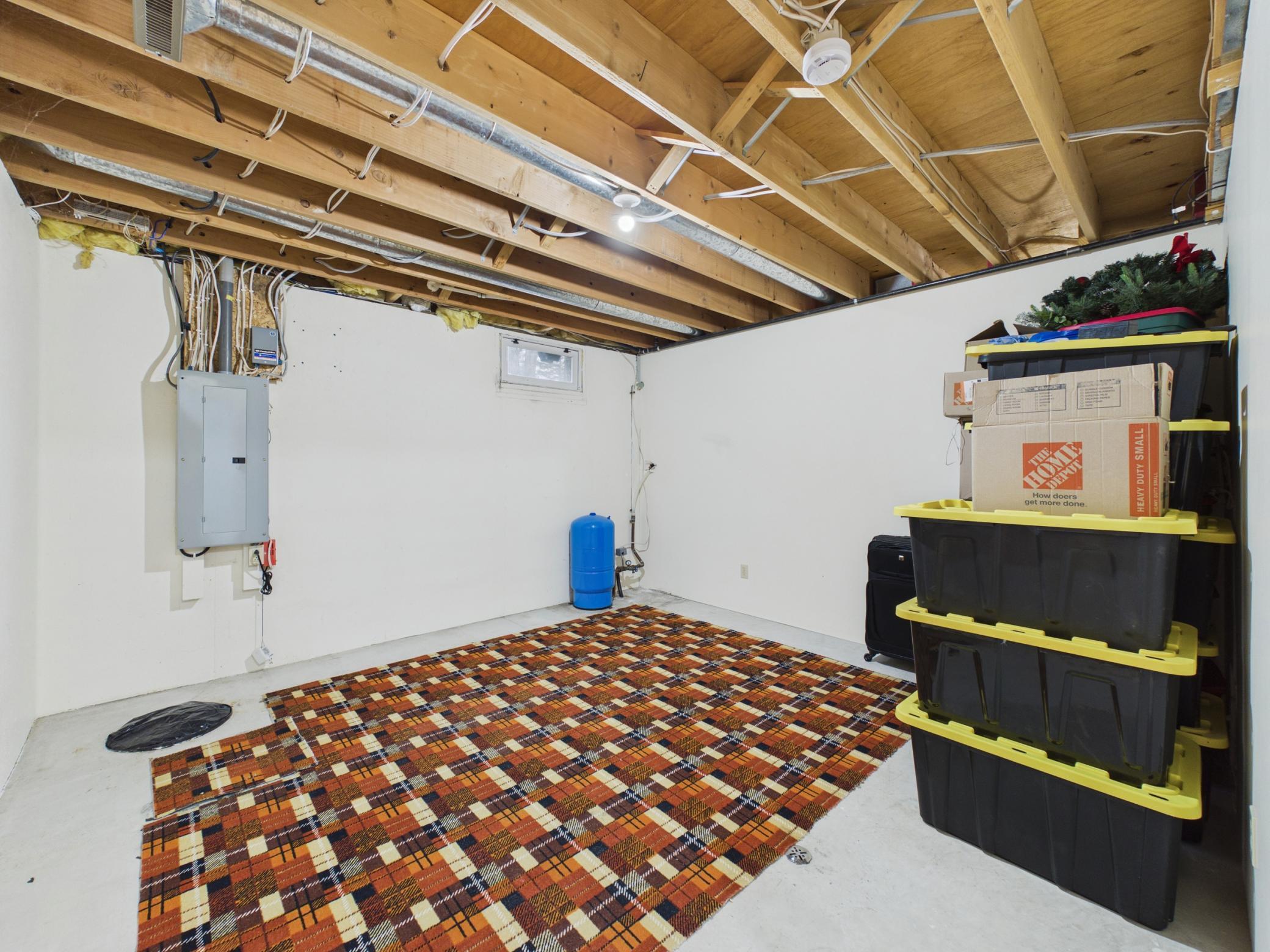 This storage/office/bonus room in the lower level is tucked away from the family room.