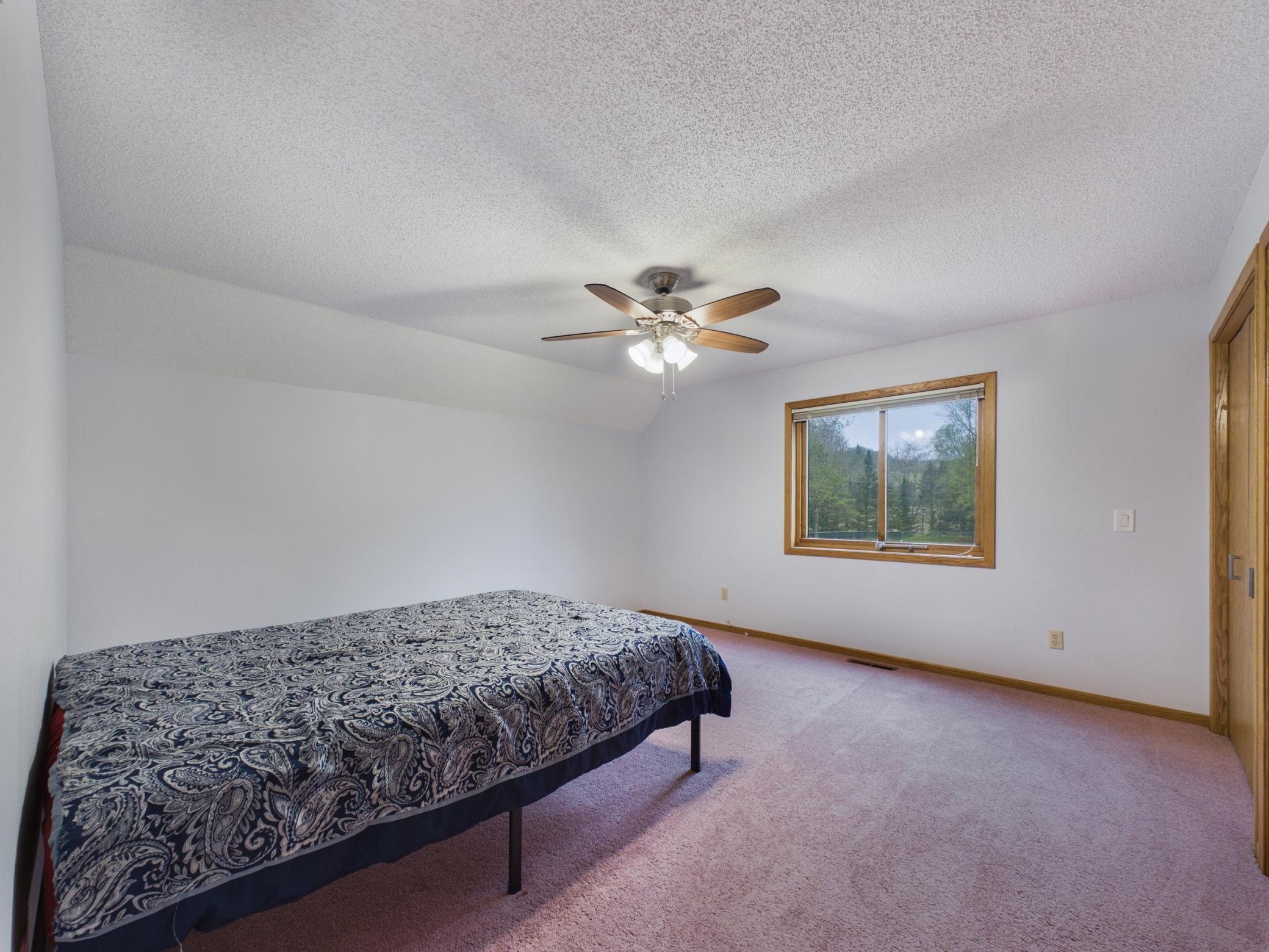 One of two bedrooms on the upper level. Great closet space, and a bathroom shared between the two bedrooms.