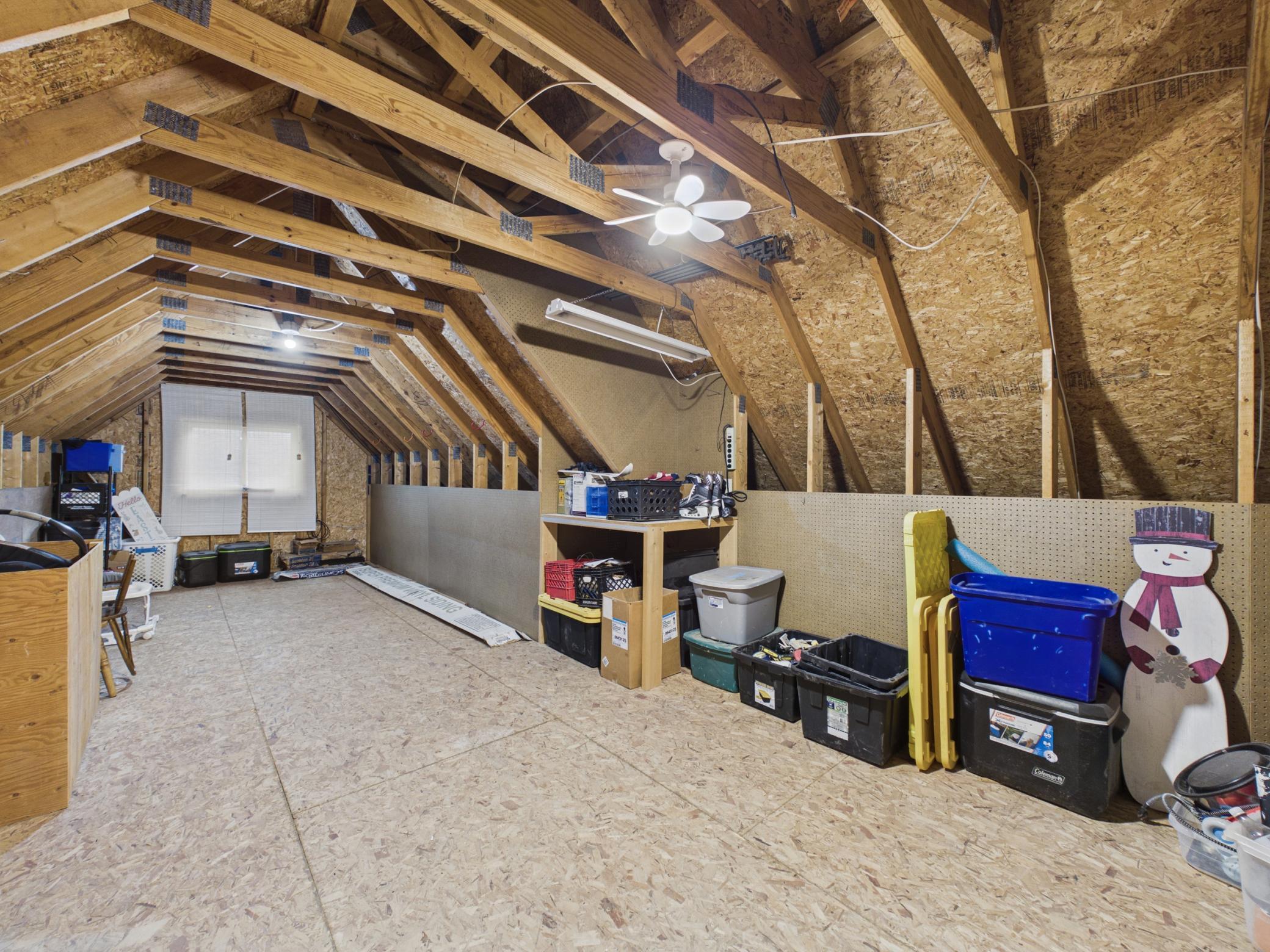 Make sure you check out the storage above the garage! 12x30 feet of space you could use for a workshop, playroom, or additional storage space.