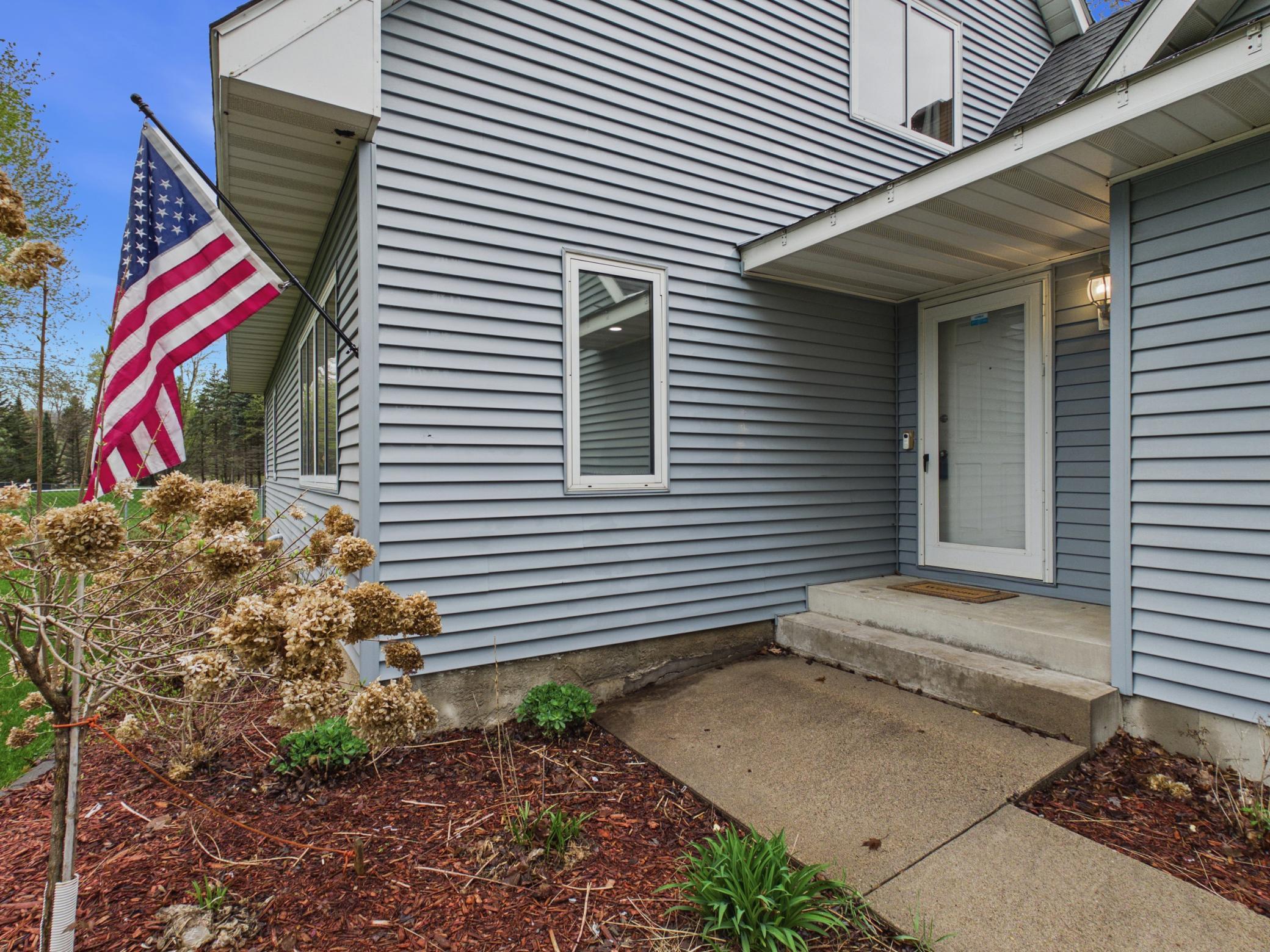 You will enjoy the unique style of this home. Front door is around the corner from the garage.
