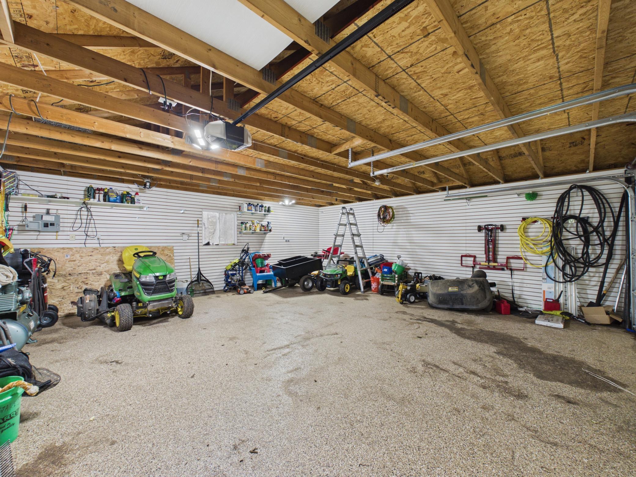 The detached garage has additional storage space above!