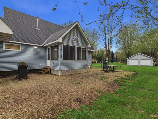 Back of the home off the three seasons porch, great entertaining space.