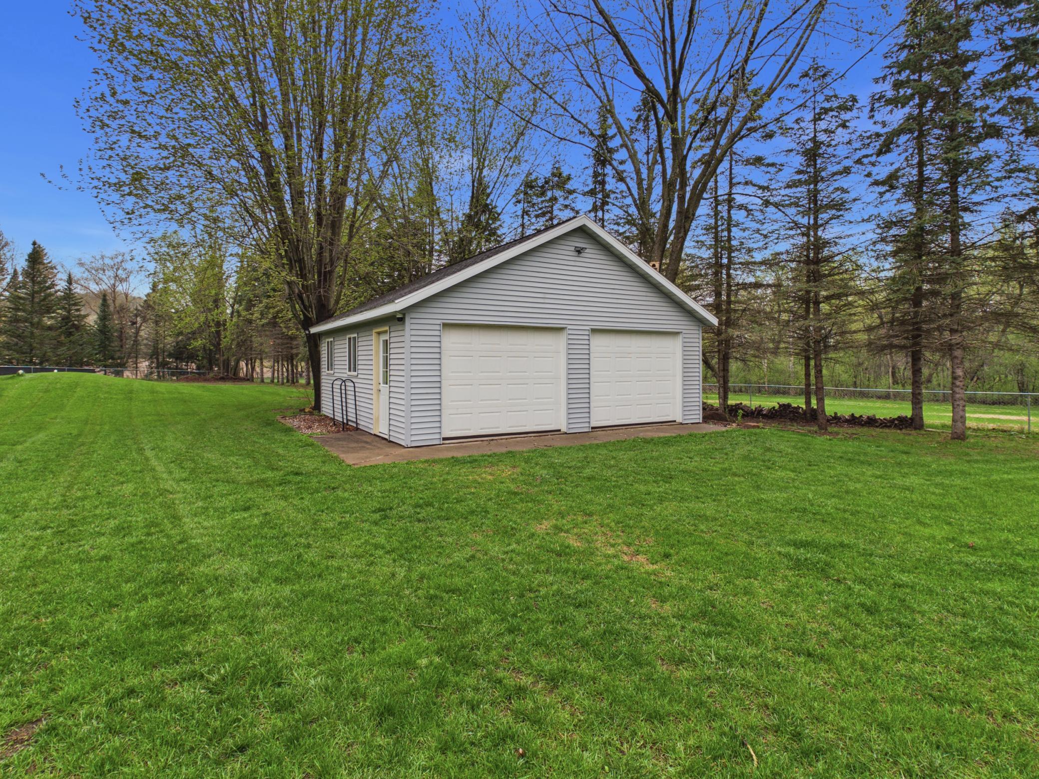 24x24 garage in the back is a great space, and easily accessible with the gate on the side of the garage.