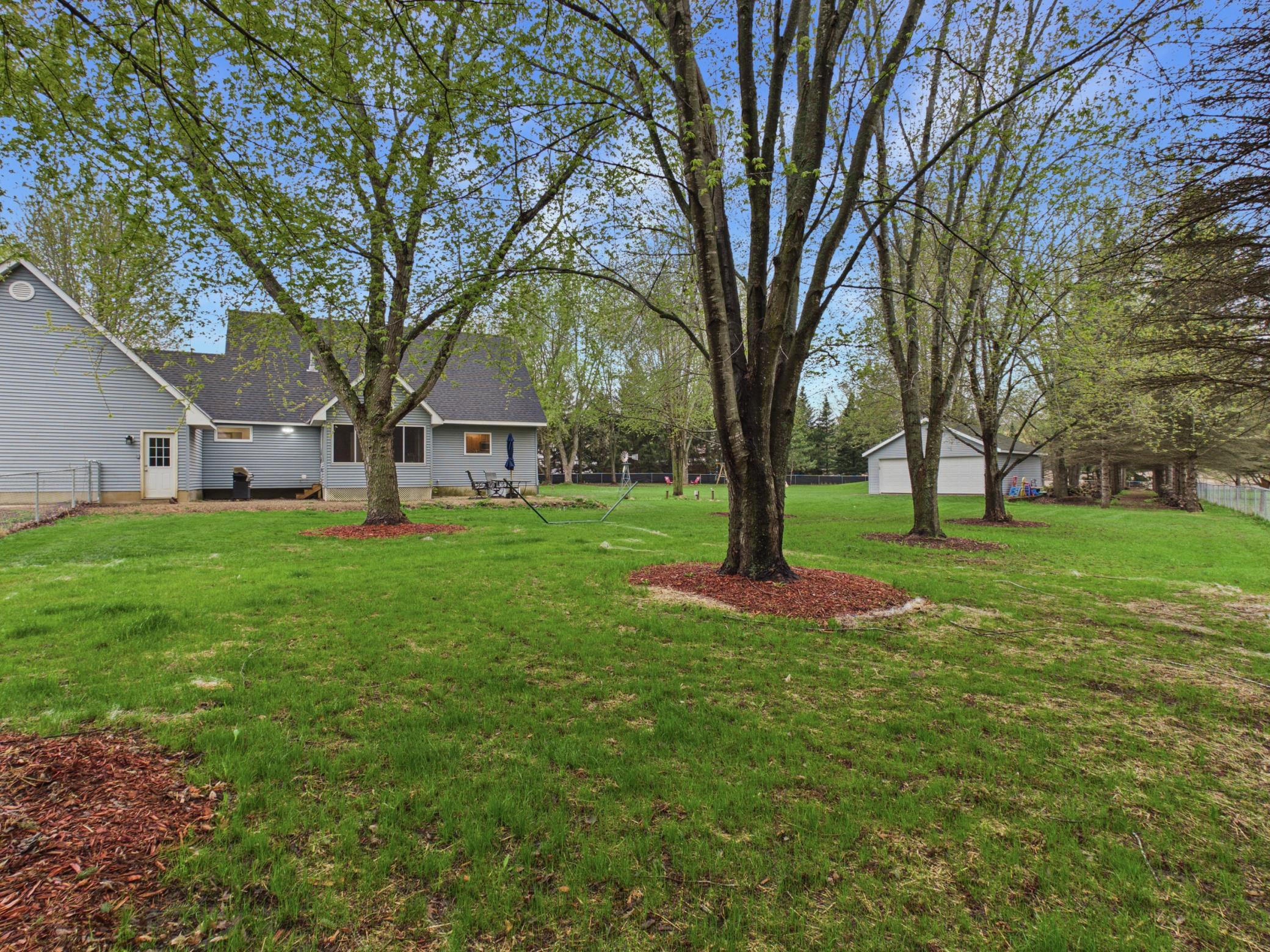 Huge fenced-in backyard provides a great space for the pets, the kids, or the adults to run around.