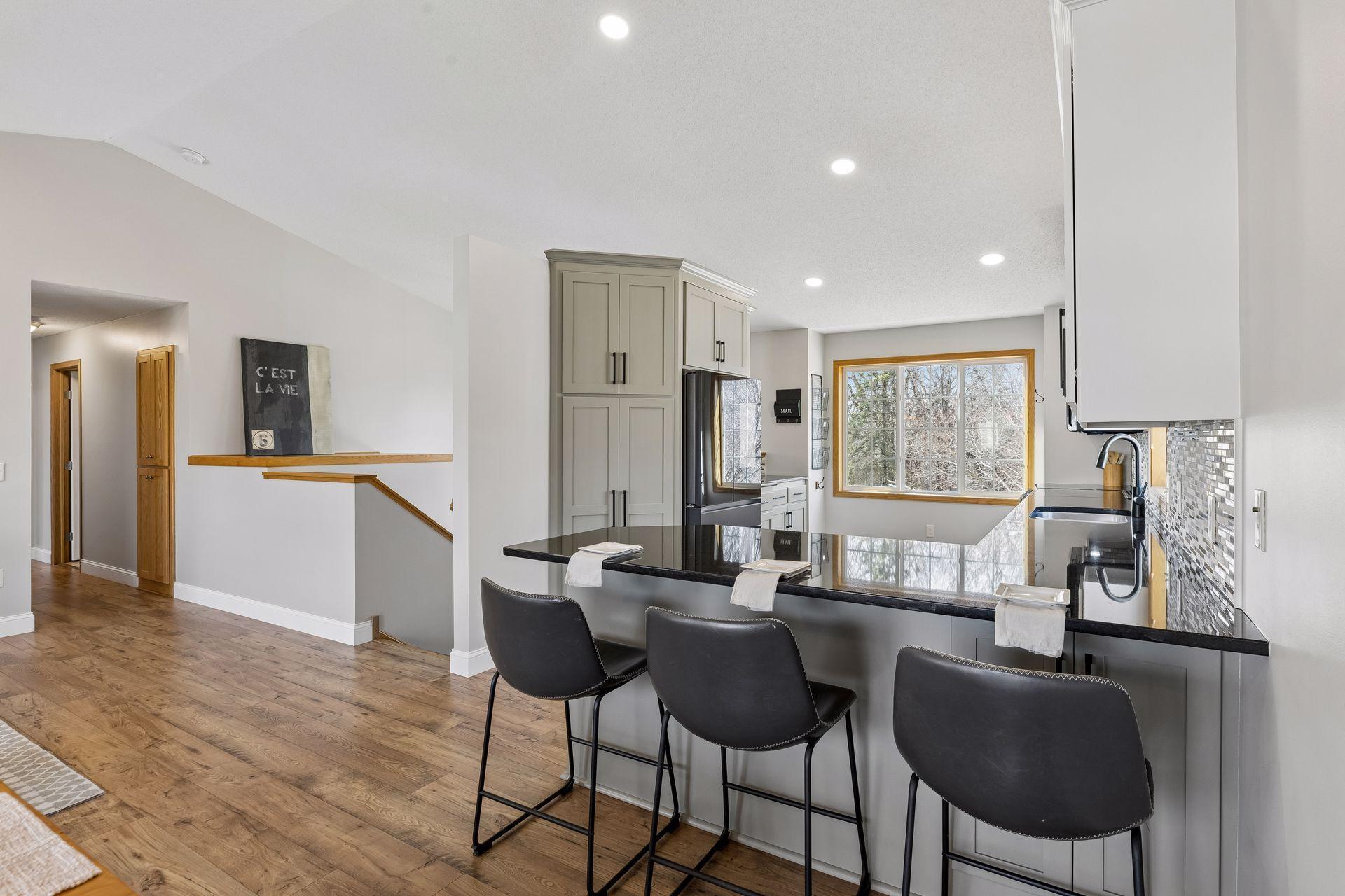 Kitchen has 2 windows that bathe the room in natural light.