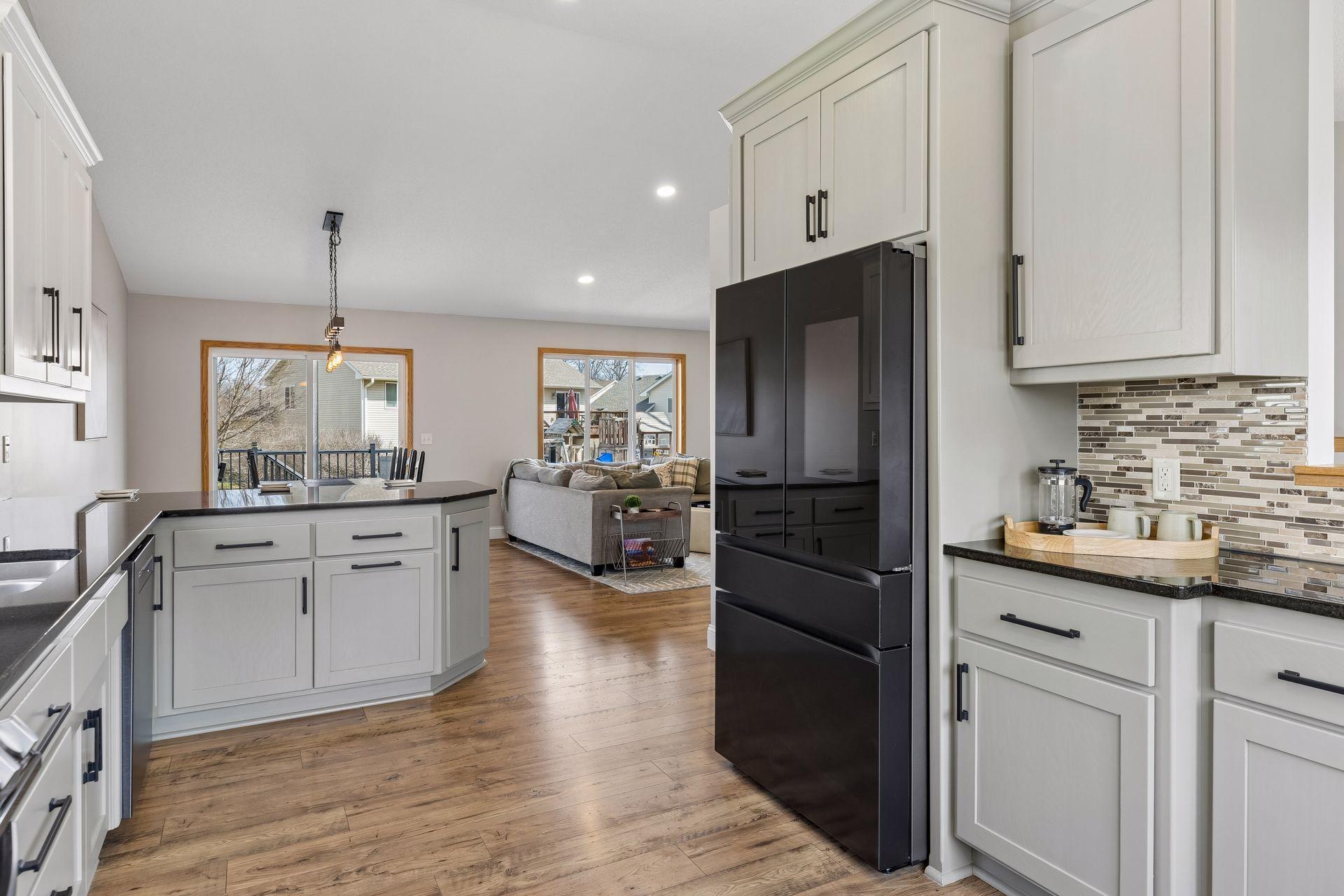 Kitchen flows seamlessly into dining and living space. Great for families and entertaining.