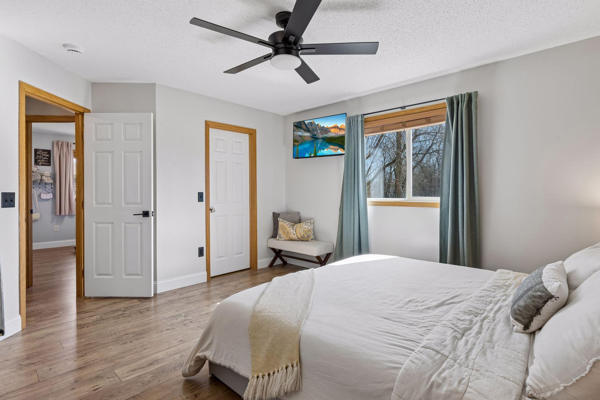 Primary bedroom has a highly desired walk-in closet.