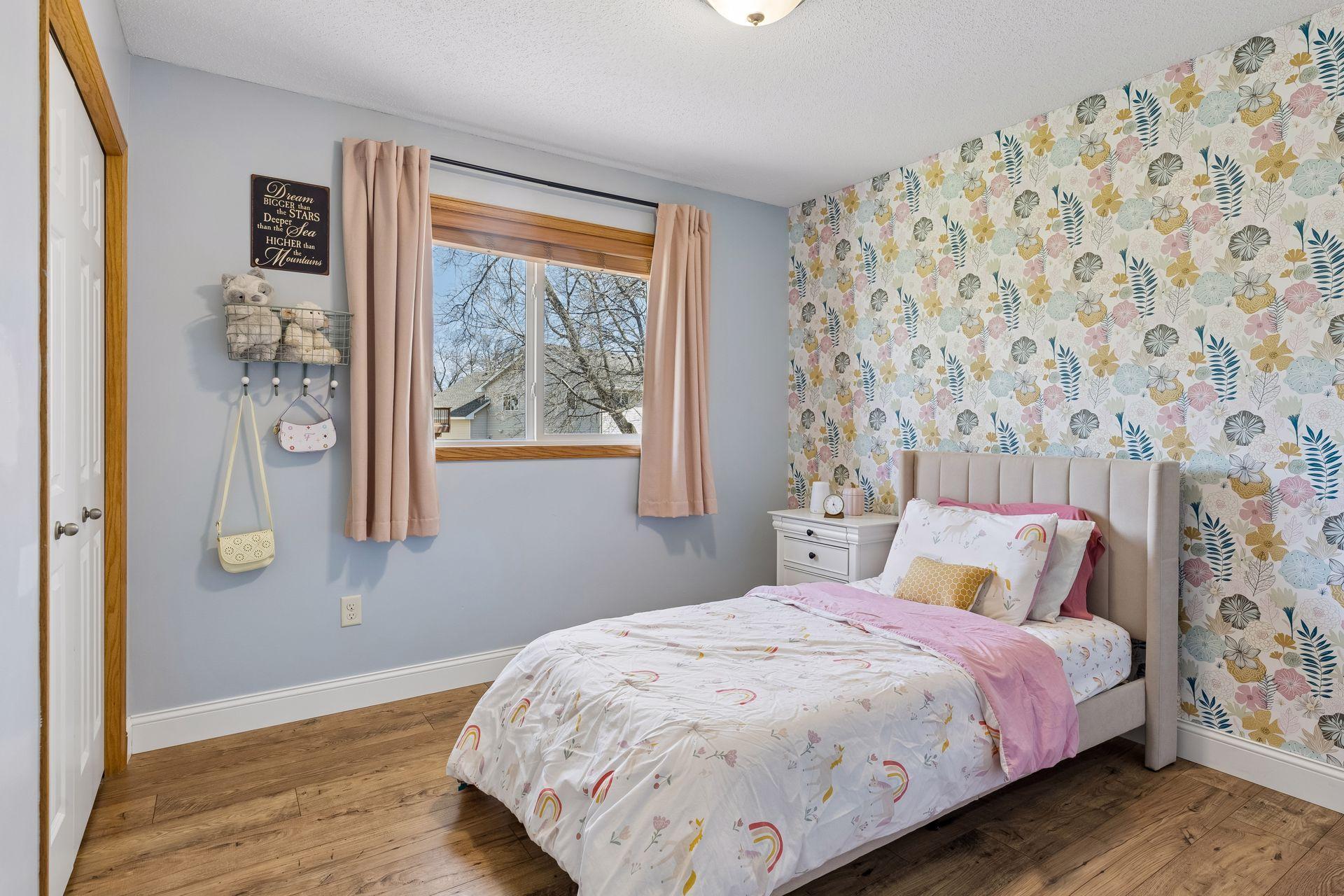 Bedrooms are spacious, and this one also has an accent wall.