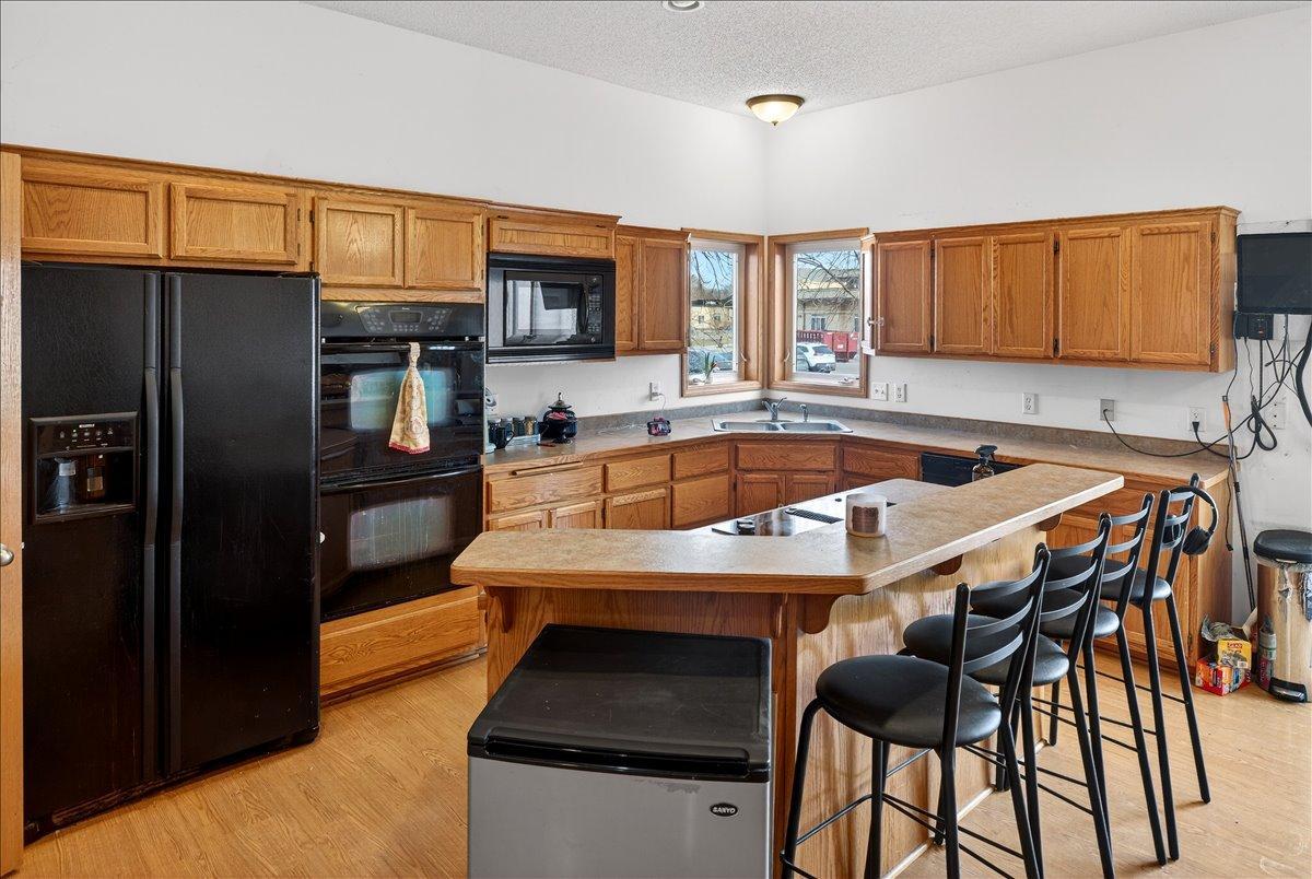 Large kitchen with island and breakfast bar