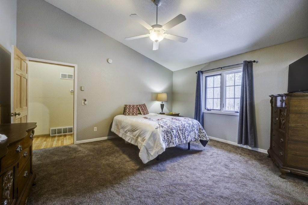 main floor primary with private bath.jpg