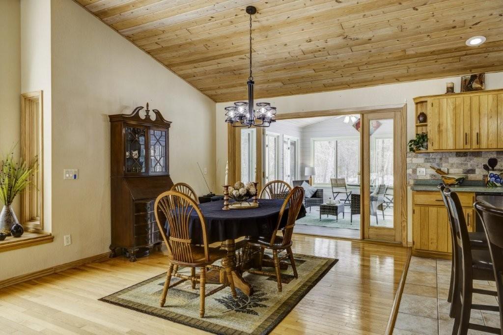 dining with double Marvin door to 4 season sunroom.jpg