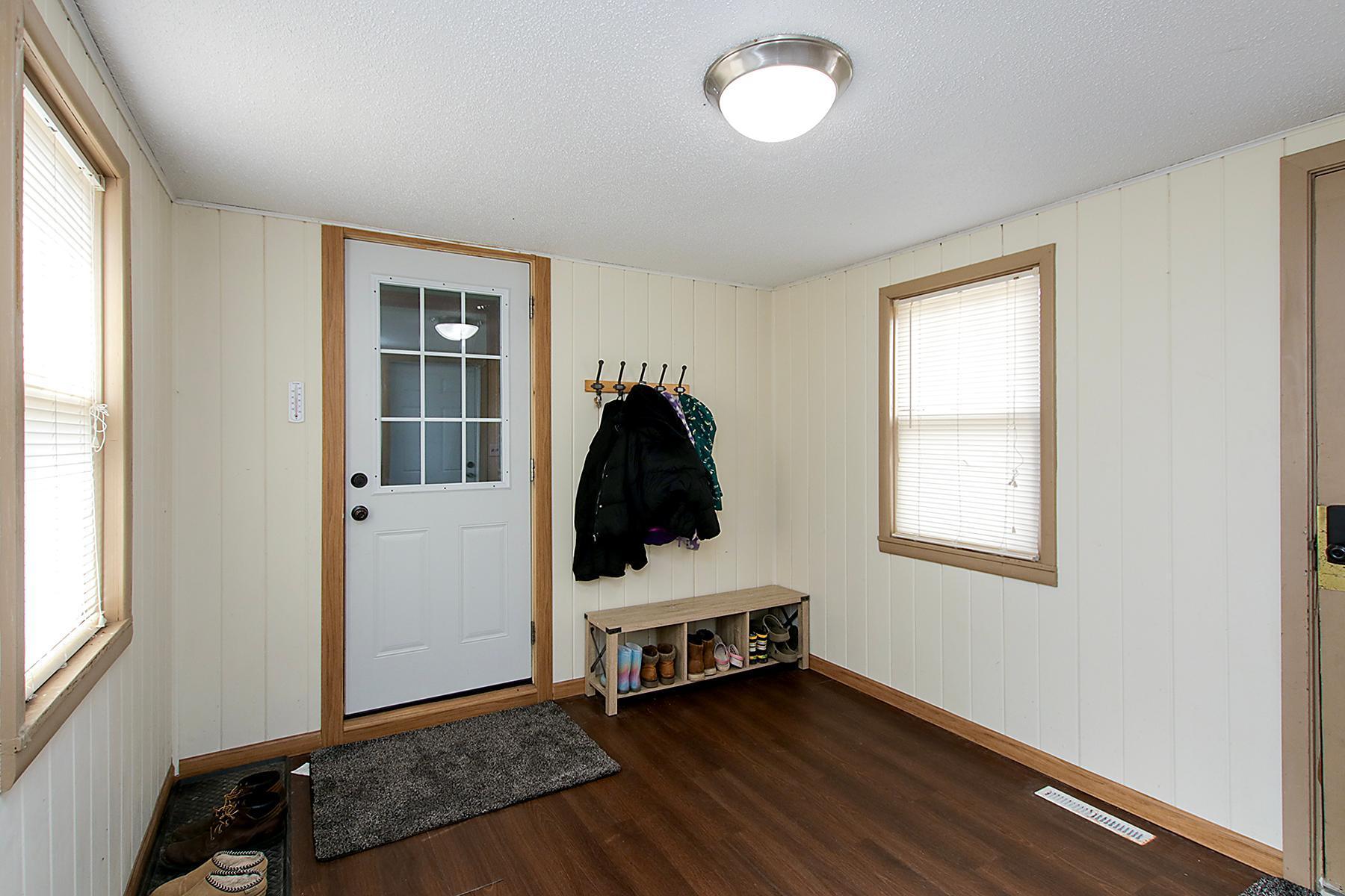Mudroom between garage and home with easy access to backyard!