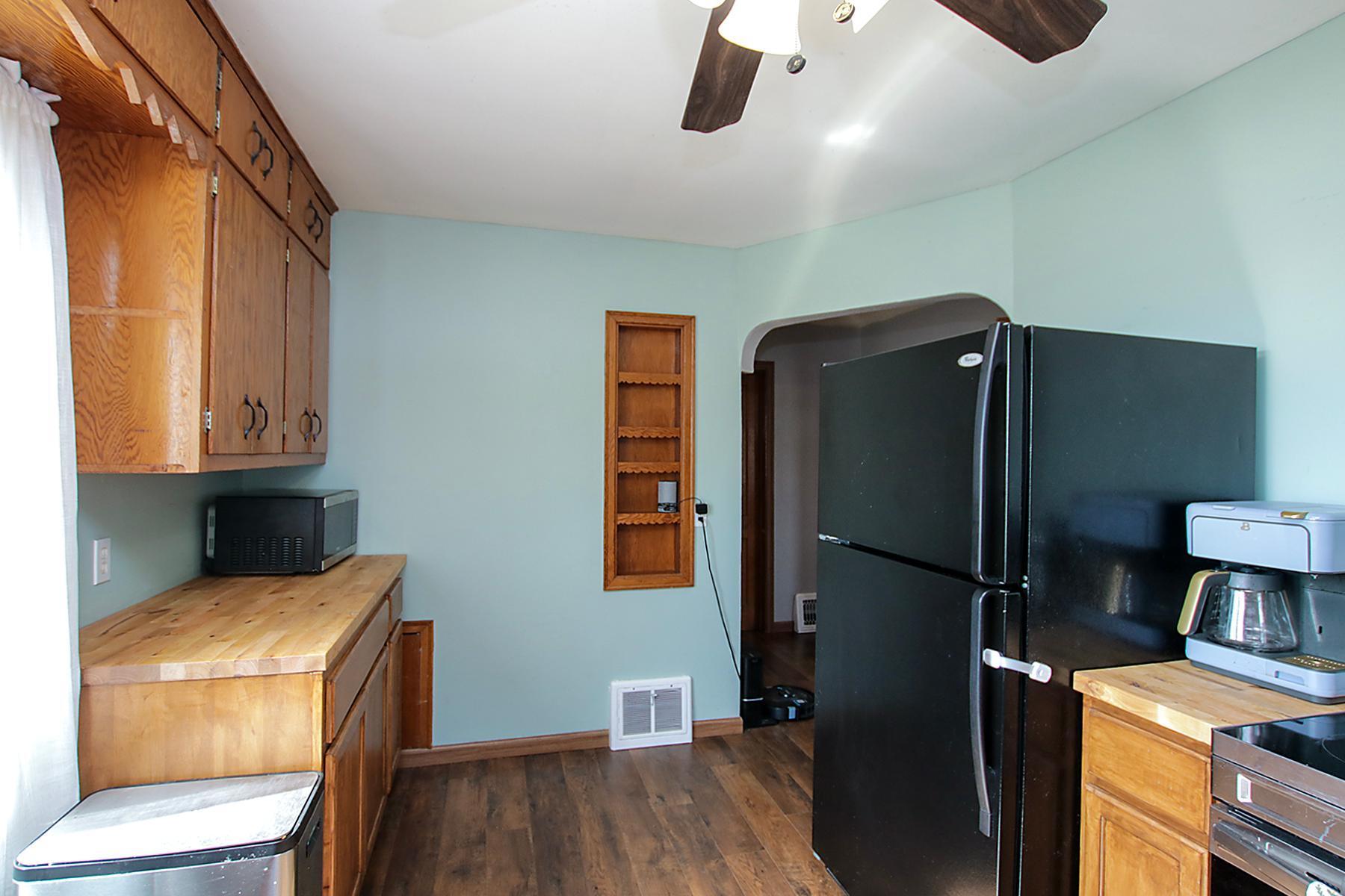 Streamlined kitchen with butcher block countertops