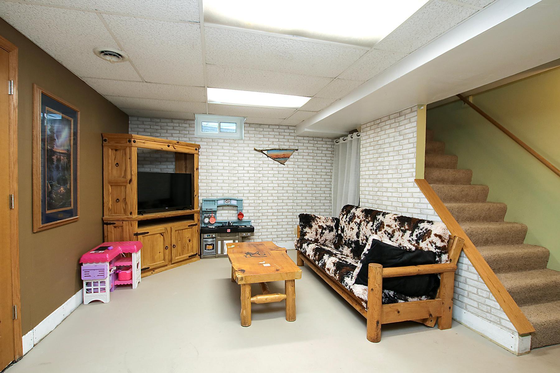 Lower level family room is great for movie nights!