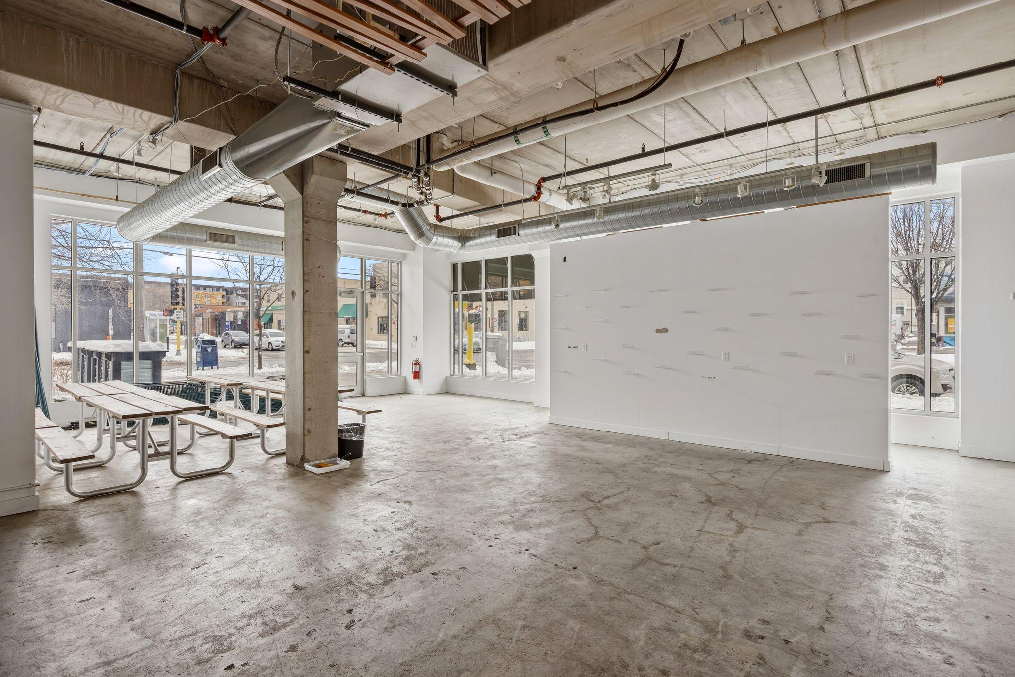 3. High Traffic Corner 28th + Lyndale w: floor to ceiling windows.jpg