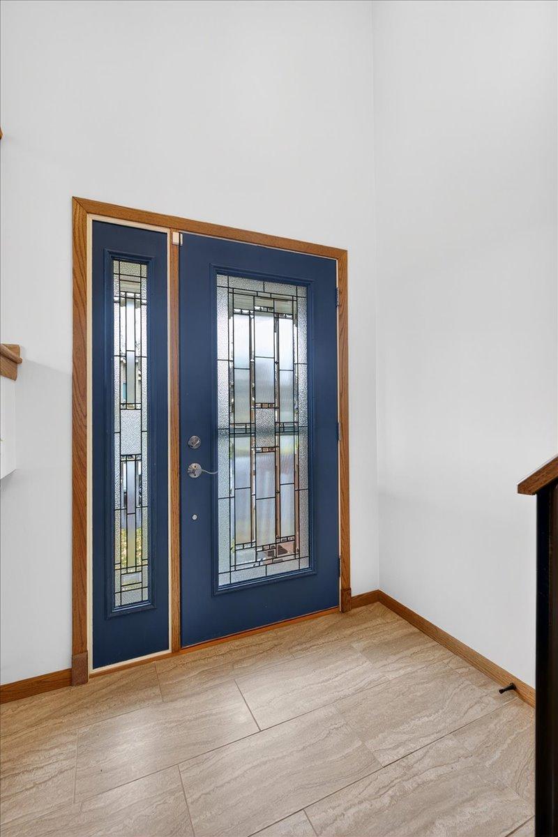 NEWER front door, NEW LVP floor