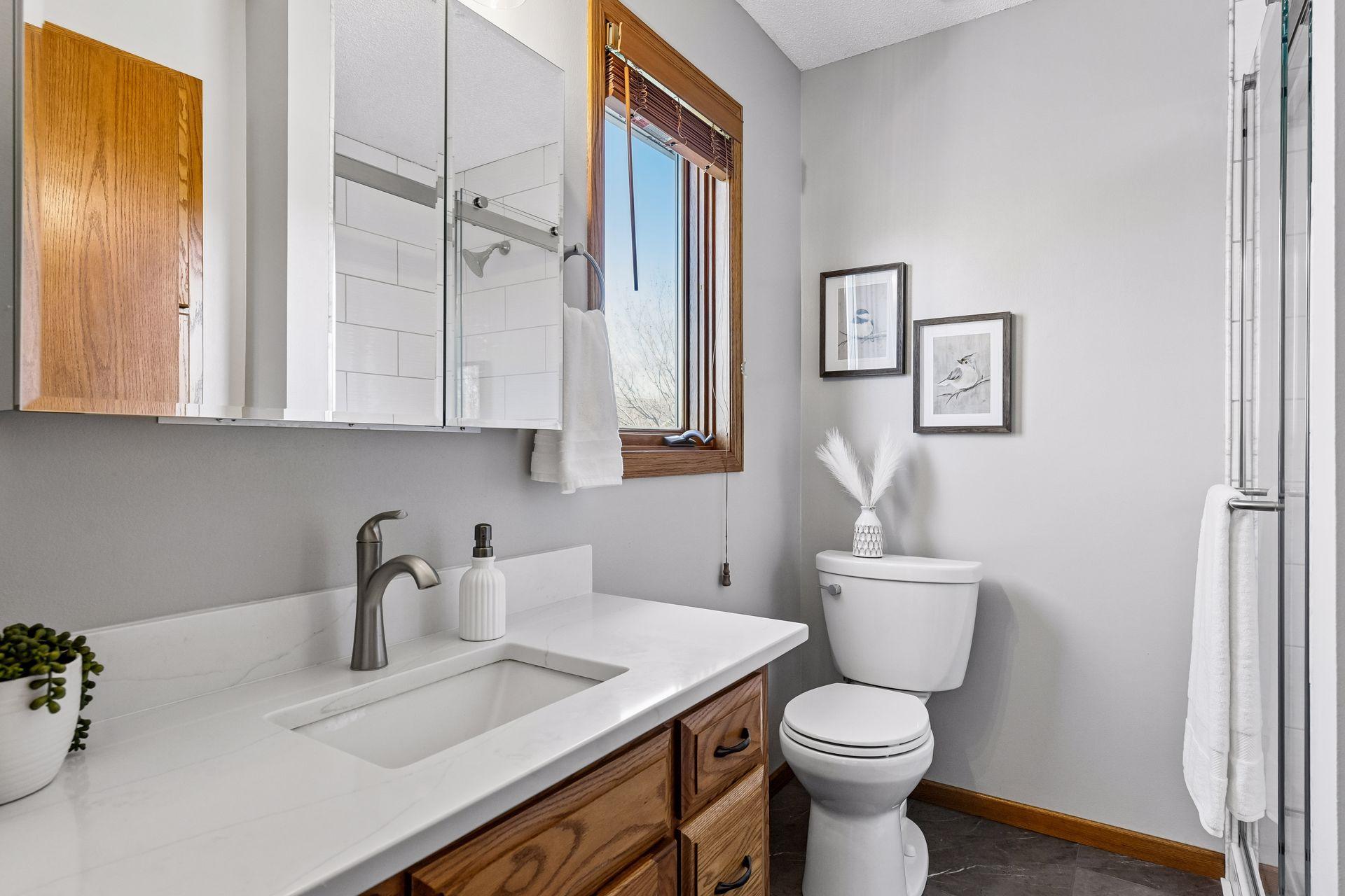 Private 3/4 primary bath with ceramic tile flooring