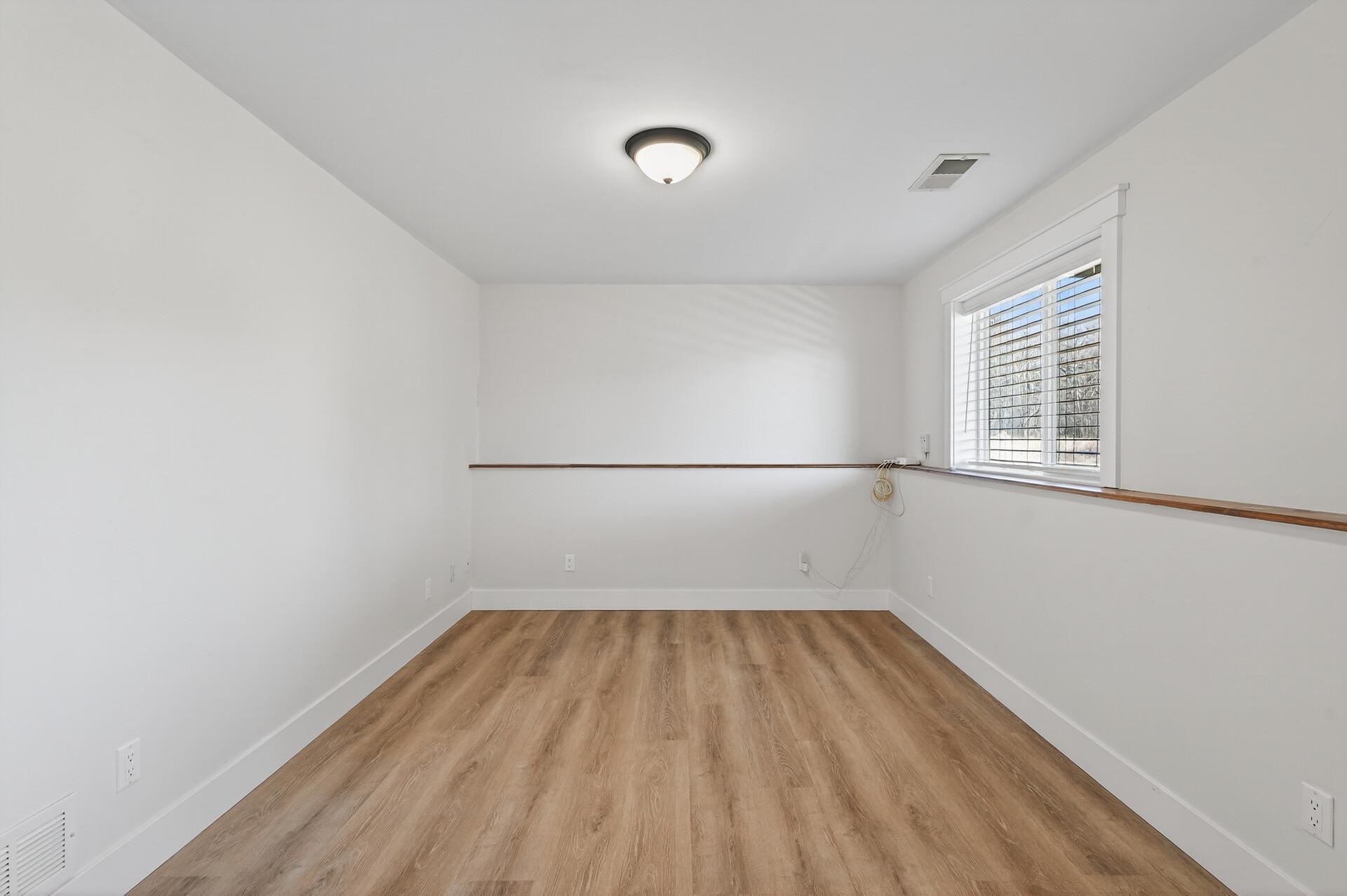 French doors open to this large room, perfect for a den or office