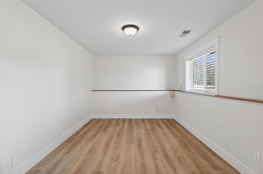 French doors open to this large room, perfect for a den or office