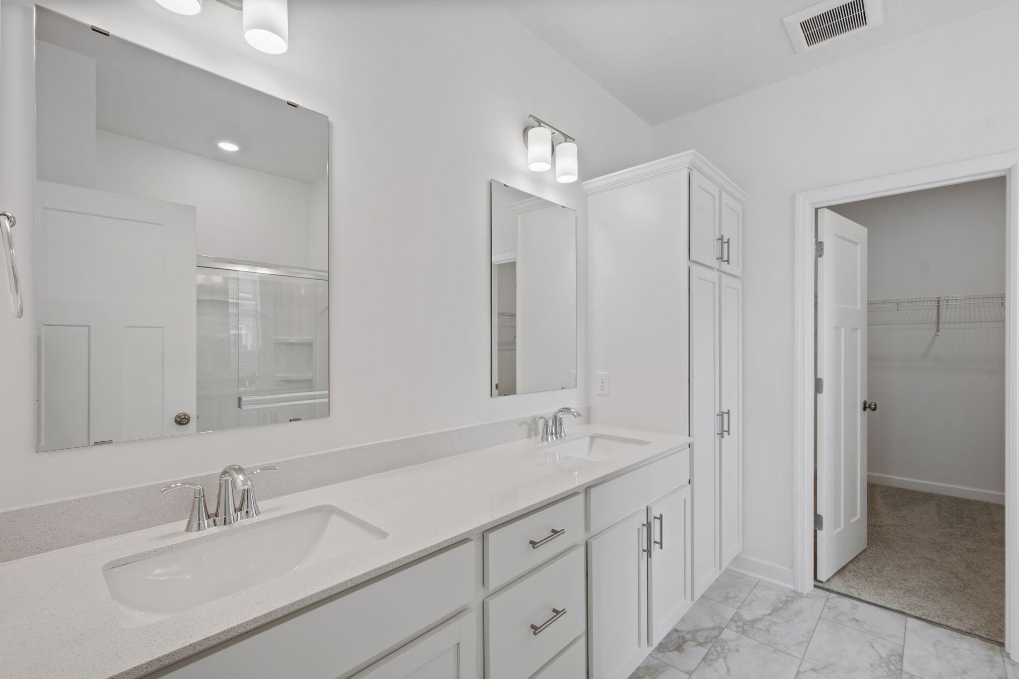 Dual sinks and a full wall-width mirror streamline getting-ready routines