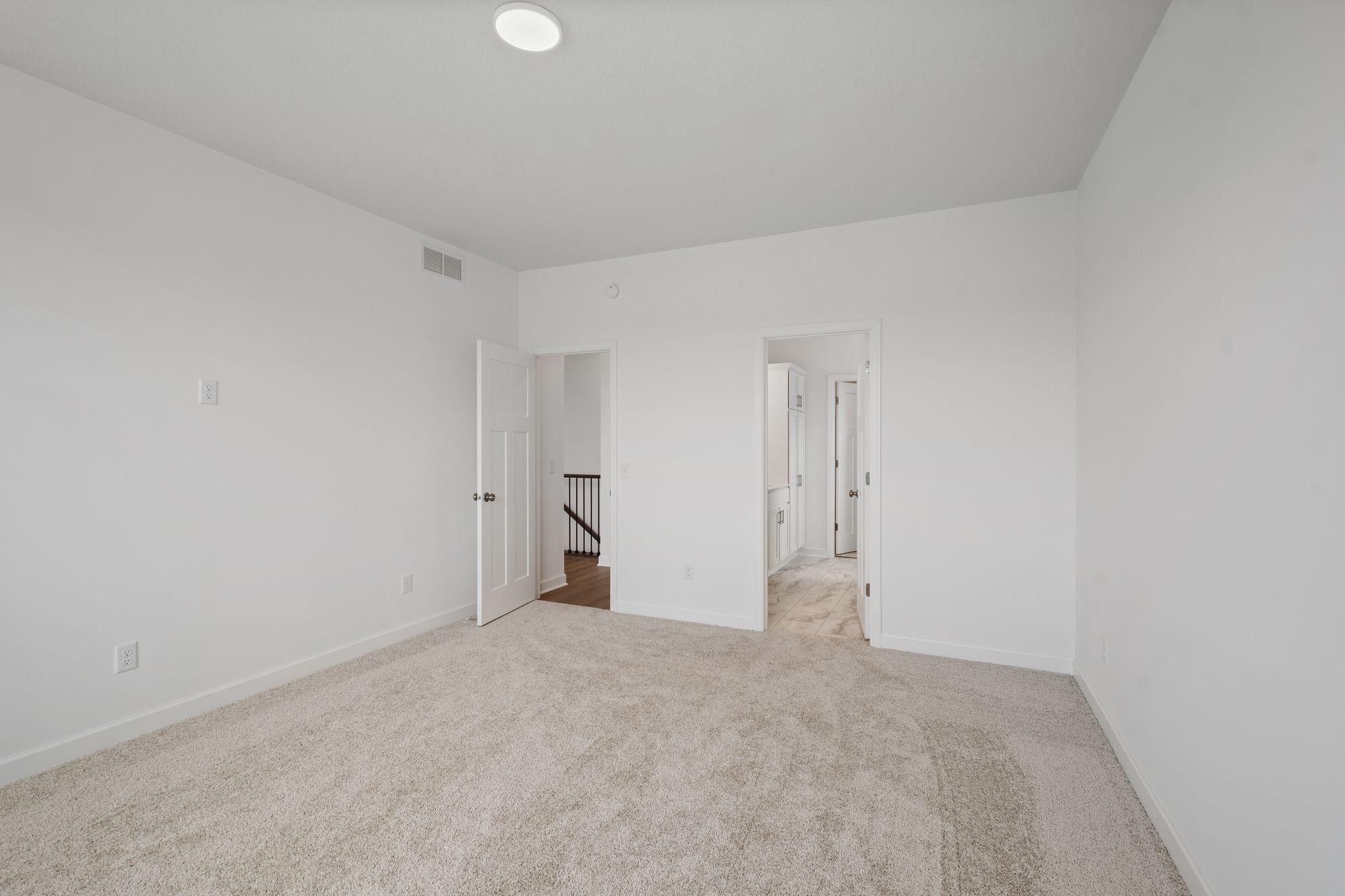 The bedroom is a comfortable retreat from the rest of the home