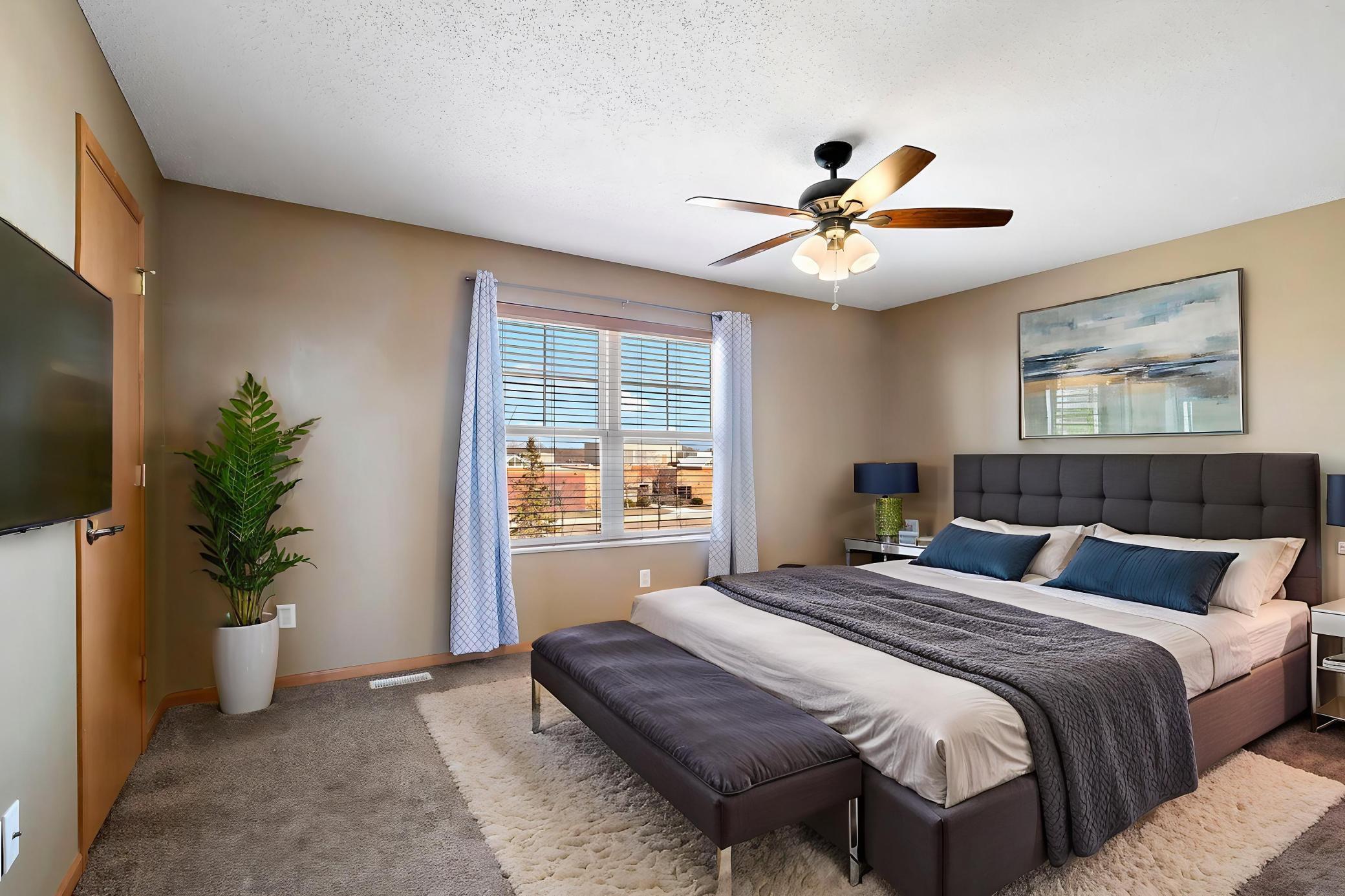 Oh, my! Can it get any better? The huge primary bedroom has a walk-in closet (left) and ensuite bathroom to the right. Virtually staged. Clover Ridge Elementary school across the street.